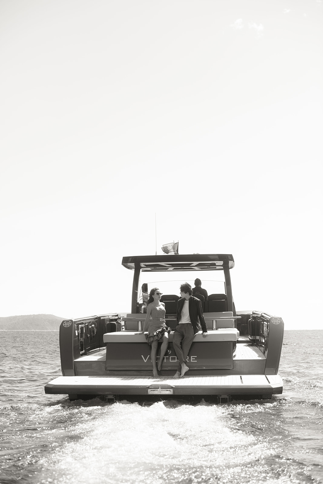Couple photographed on the stern of a yacht in the Gulf of Saint-Tropez